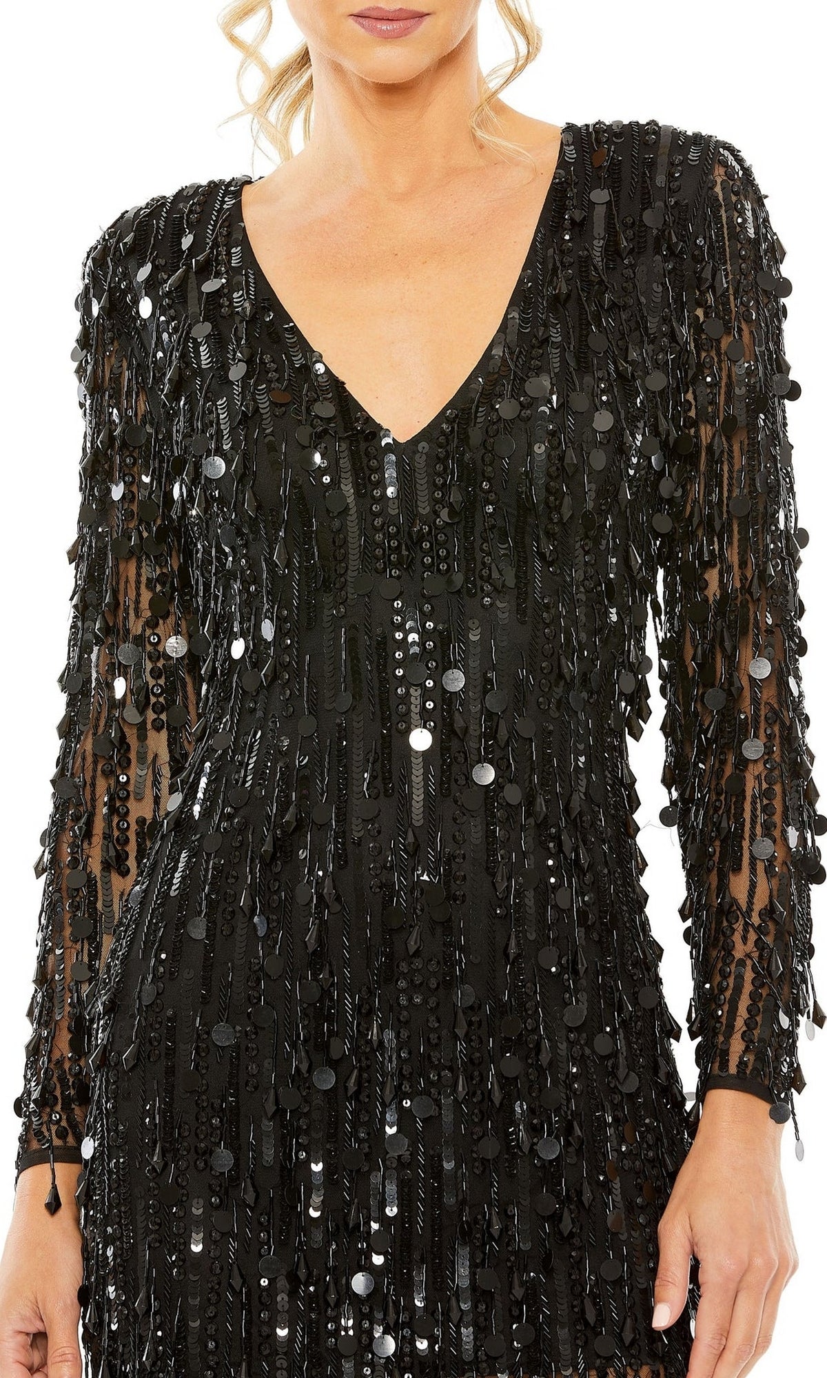 Woman wearing the Mac Duggal 93850 short black beaded party dress, featuring long sleeves, shimmering sequins, a V-neckline, and textured embellishments.